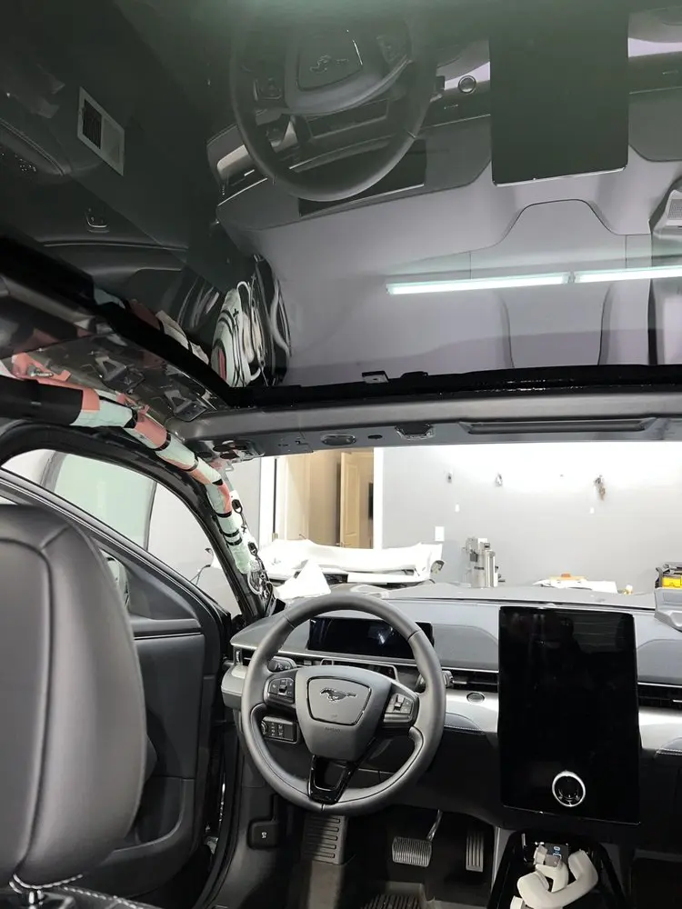 Auto services in Deal - Mustang undergoing windshield replacement at Master Auto Glass.